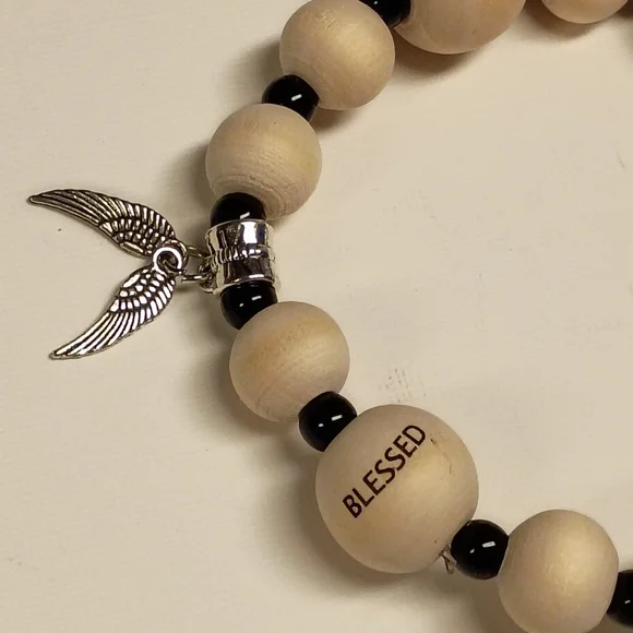 Hand Crafted Natural Wood and Black Bead Bracelet with Silver Wing Charm - Picture 2 of 6